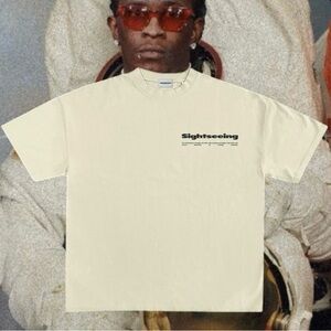 Cream on Black Sightseeing Tshirt in sizes medium and large.